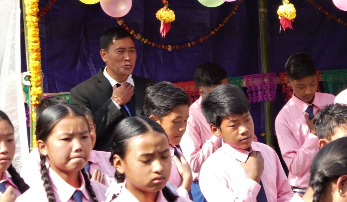 1_2Headteacher-Chandramani-with-pupils